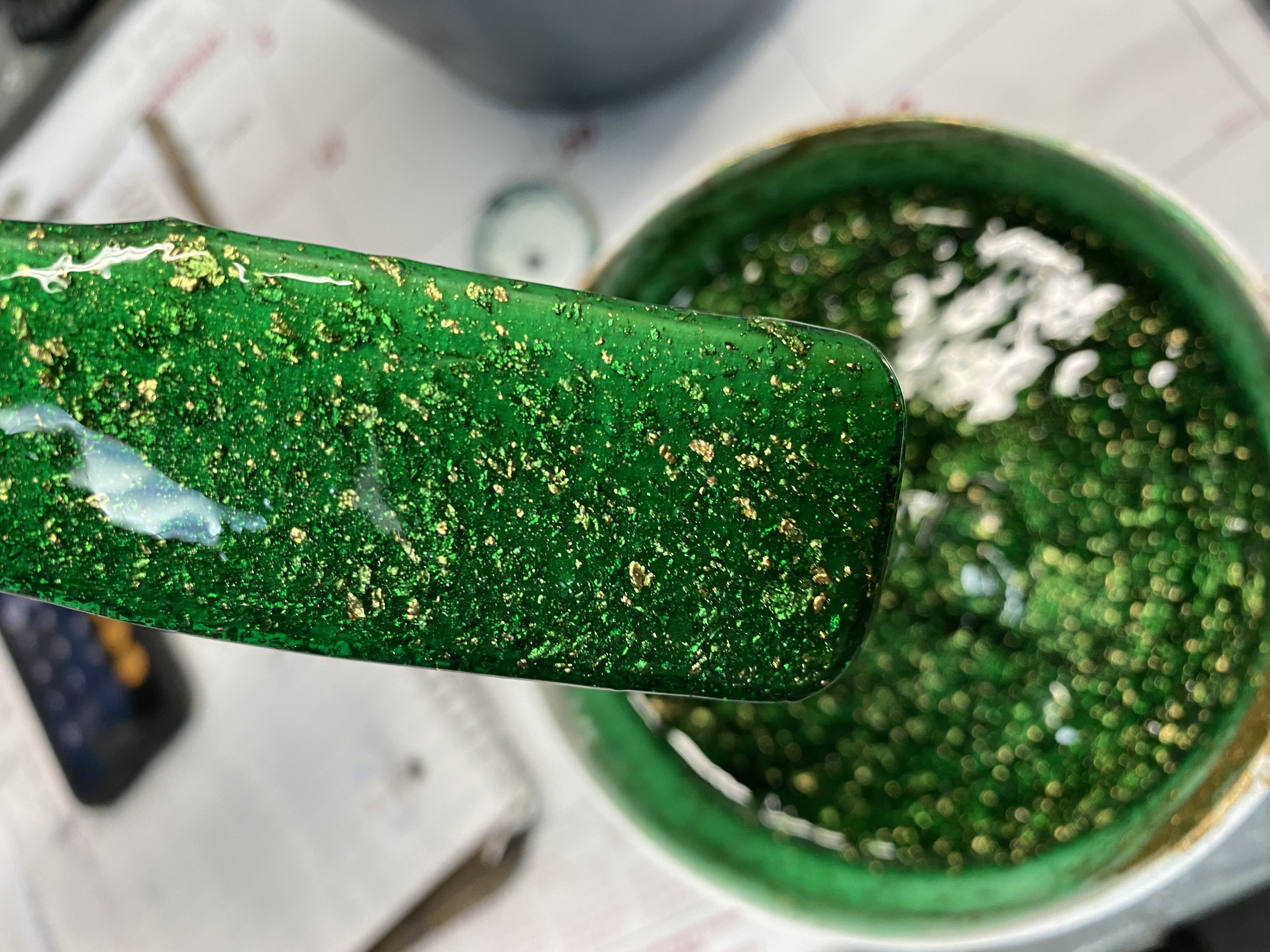 Metallic-tinted green slime with reflective properties