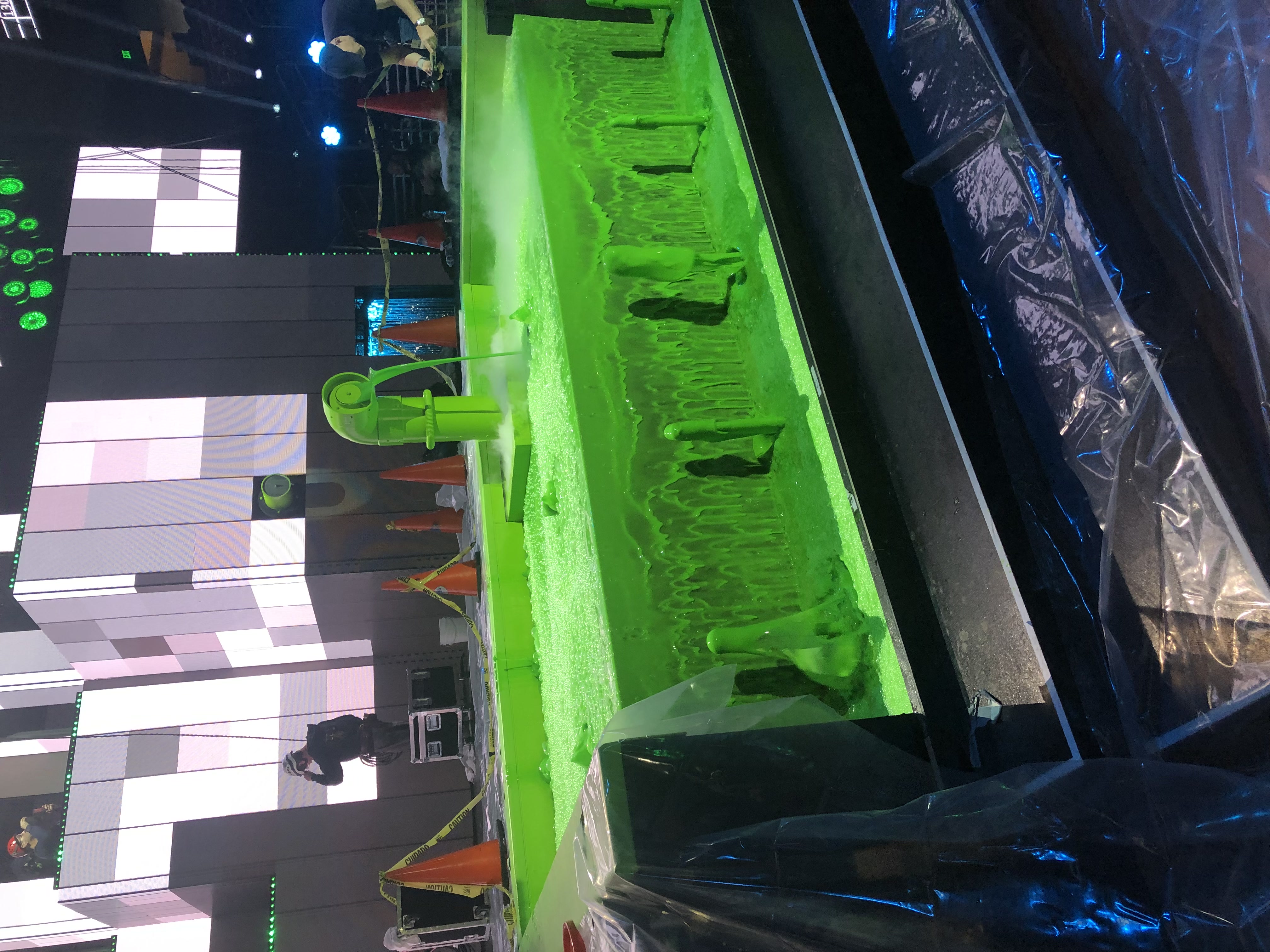 Green slime oozing from an industrial pipe for special effects