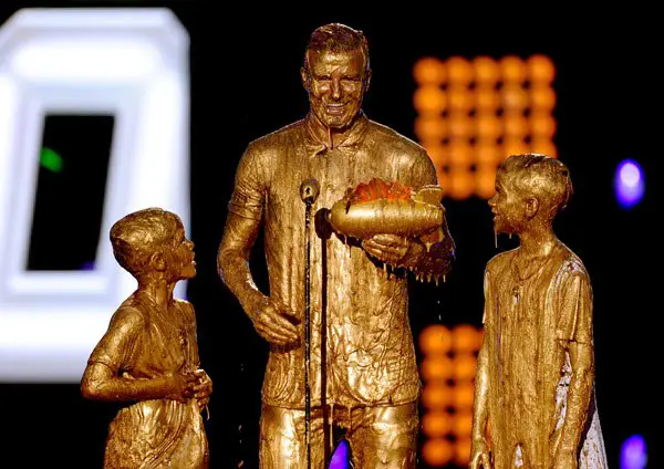 David Beckham getting covered in gold slime at Nickelodeon Kids Choice Sports Awards