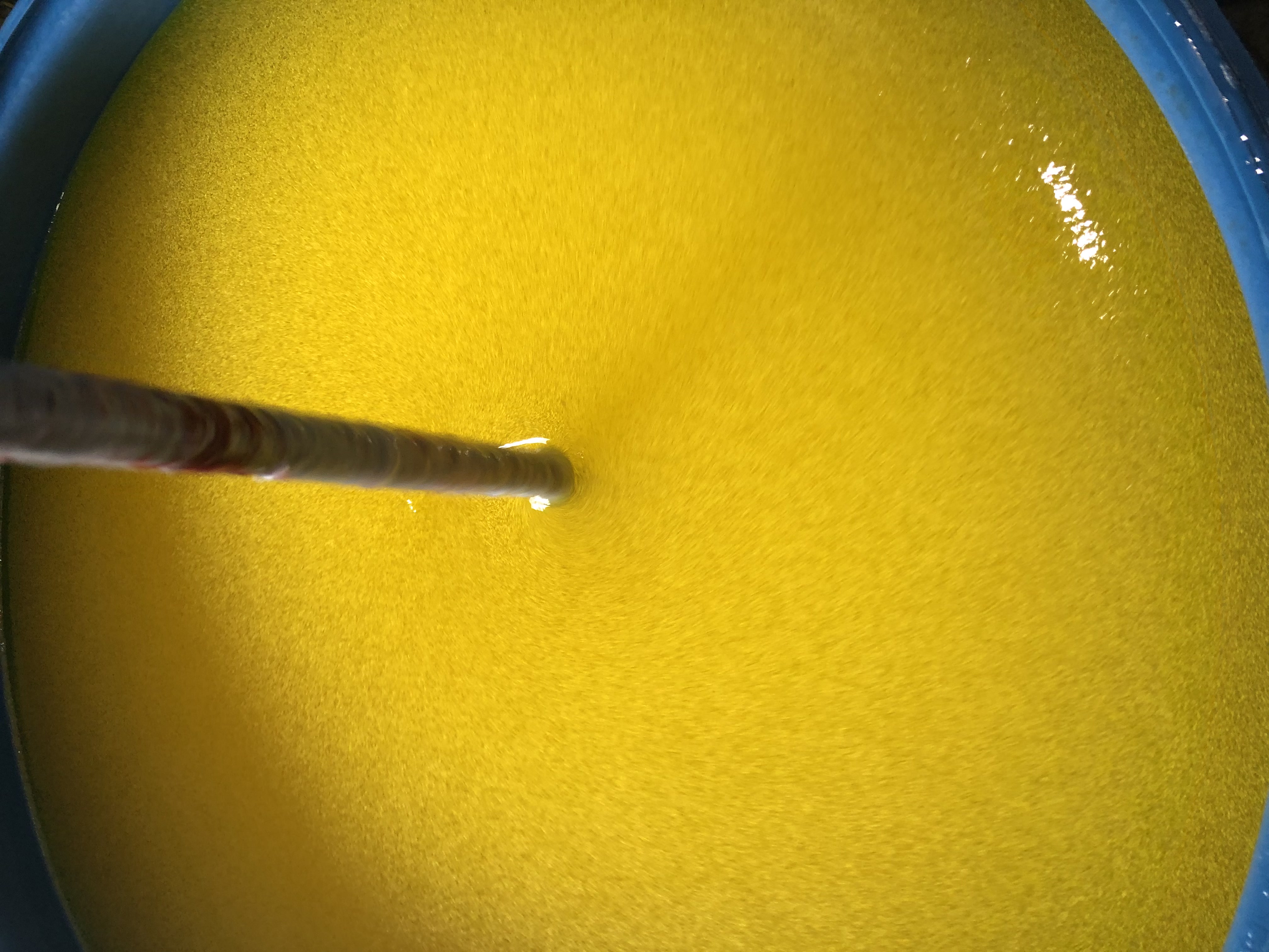 Bright yellow super slime with thick, viscous consistency